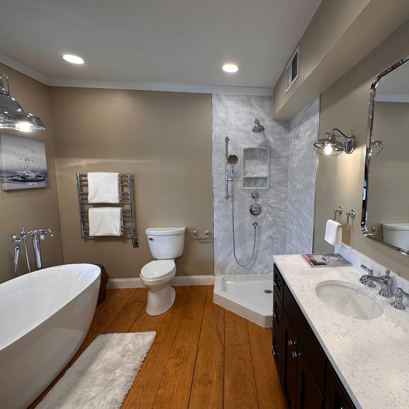 Image of a bathroom sink, toilet, and bathtub
